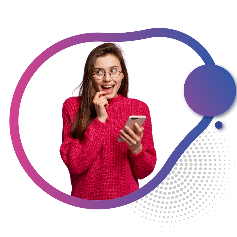 Smiling woman looking sideways holding smartphone happily.