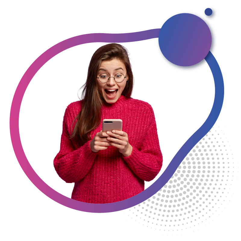 Woman laughing while viewing smartphone screen