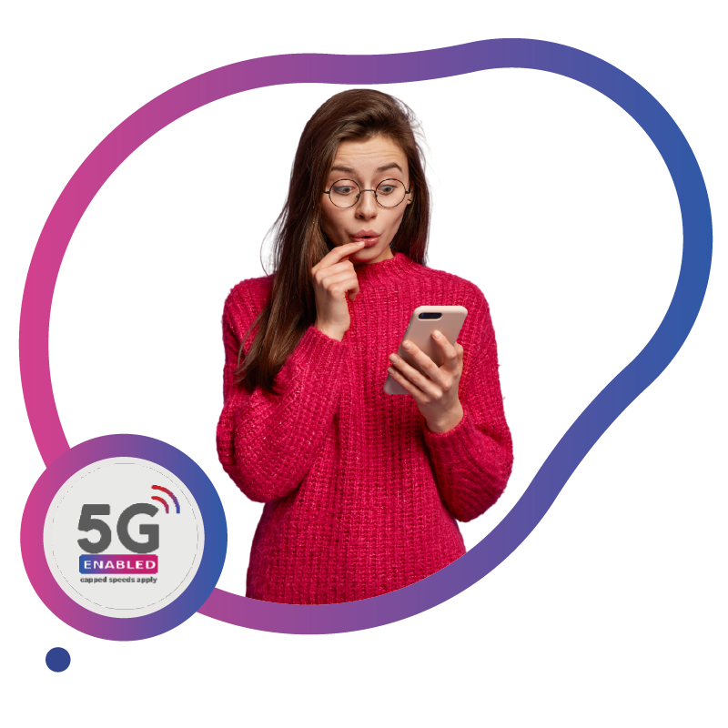 Surprised woman in red sweater checking 5G smartphone.